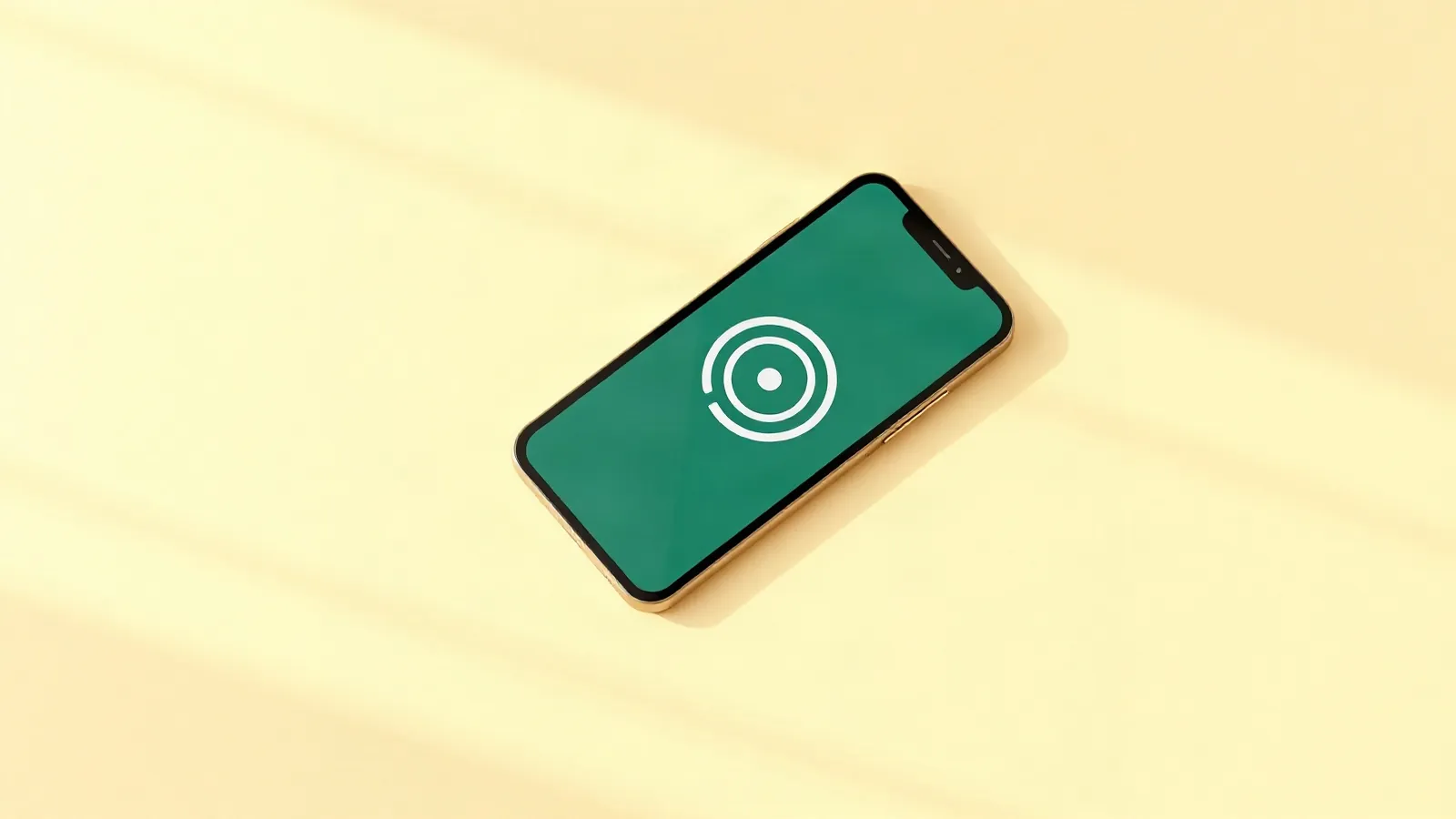Modern smartphone on a light surface with a signal icon on its screen